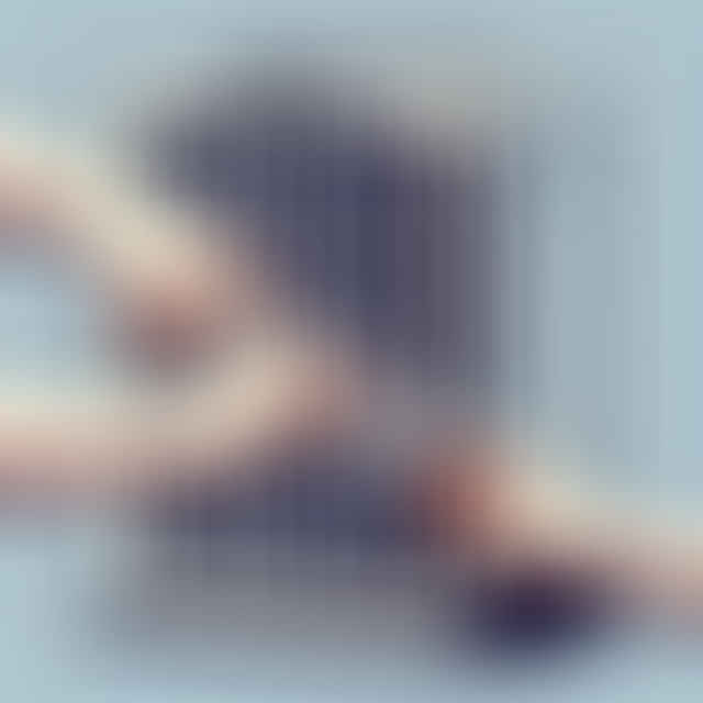 hands opening the filter panel on a Holmes air purifier